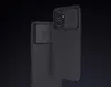 Two black phone cases with camera covers are displayed against a black background. Náhled obrázku produktu