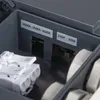 A close-up view inside a product's housing, showing labels and electrical connectors. Náhľad obrázku produktu