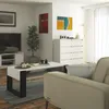 A living room scene with a dresser, coffee table, and sofa. Anteprima dell’immagine prodotto