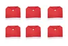 Six red chair covers with white trim and a white pom-pom, resembling Santa hats. Produktbild-Vorschau