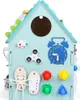 A close-up, side view of a multi-functional activity board shaped like a house, designed for children's learning and play. Náhled obrázku produktu