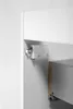 A close-up view of a cabinet hinge and drawer slide mechanism. Produktbild-Vorschau