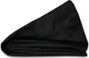 A black pillow cover is folded and lying on a white background. Produktbild-Vorschau