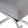 A close-up view of a gray upholstered chair with silver metal legs. Náhľad obrázku produktu