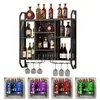 A multi-tiered wine rack filled with various bottles of wine and liquor, with wine glasses hanging from the bottom rack. Produktbild-Vorschau