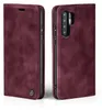 A product shot of a burgundy flip phone case for a Huawei P30. Produktbild-Vorschau