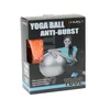 The image shows the retail packaging of a yoga ball. Voir les images du produit
