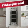 A folding stepladder is stored inside a kitchen cabinet. Produktbild-Vorschau