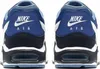 The back view of a pair of Nike Air Max Command sneakers. Voir les images du produit