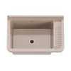 A top-down view of a beige sink basin. Anteprima dell’immagine prodotto