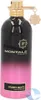 A perfume bottle with a gradient black and pink design, featuring gold accents and a decorative charm. Náhled obrázku produktu
