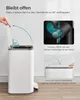 An instructional image showing how to open and keep open a trash can lid. Produktbild-Vorschau