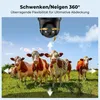 A security camera is shown above a herd of cows in a field, illustrating its wide coverage. Náhled obrázku produktu