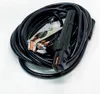 A coiled black cable with two clamps attached, one silver and one black, against a white background. Produktbild-Vorschau