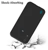 A black phone case is shown falling onto a cracked surface, illustrating its shock-absorbing capabilities. Podgląd zdjęcia produktu
