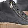 Close-up of a black leather boot with a gold zipper and laces. Produktbild-Vorschau