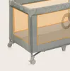 A close-up view of the corner and wheels of a gray and beige baby travel cot. Produktbild-Vorschau