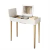 A white vanity table with a mirror and storage compartments, set against a white background. Produktbild-Vorschau
