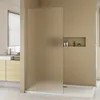 A modern bathroom with a frosted glass shower door, vanity, and sink. Produktbild-Vorschau