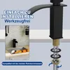 A close-up of a black waterfall faucet with text overlays and a small inset image of a sink with fruit. Produktbild-Vorschau