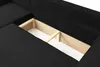 A close-up view of the interior storage compartment of a black sofa. Voir les images du produit
