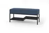 A blue upholstered bench with a black metal frame and two shelves for shoe storage, presented on a white background. Náhľad obrázku produktu
