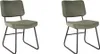 Two green upholstered dining chairs with black metal legs are shown against a white background.
