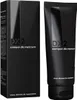 A black box and a black tube of DX2 shampoo for men are displayed against a white background. Podgląd zdjęcia produktu