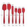 A set of red silicone kitchen utensils with dimensions and weights labeled. Produktbild-Vorschau