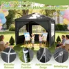 A family is enjoying an outdoor activity under a pop-up gazebo. Voir les images du produit