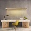 A modern office desk setup with a hanging lamp, desk lamp, chair, and books. Náhľad obrázku produktu
