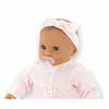 Close-up of a baby doll wearing a pink headband and outfit, with a pacifier in its mouth. Produktbild-Vorschau