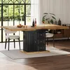 A dining table with storage in a well-lit room with large windows. Náhled obrázku produktu