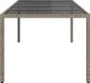 A rectangular outdoor table with a glass top and woven rattan base, shown from a front-facing, slightly elevated angle against a white background. Náhled obrázku produktu