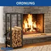 A fireplace with a fire burning, a metal log holder filled with firewood, and fireplace tools next to it. Náhľad obrázku produktu