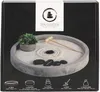 The image shows the packaging of a Zen Garden kit. The packaging features a prominent image of the Zen Garden itself, along with text and icons indicating the contents. Náhled obrázku produktu