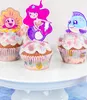 Three decorated cupcakes on a white cake stand. Produktbild-Vorschau