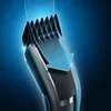 Close-up of a hair clipper with a blue arrow indicating a feature. Náhled obrázku produktu