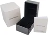 The image shows the packaging for an Emporio Armani watch, including the outer box, the inner watch case, and an instruction booklet. Produktbild-Vorschau