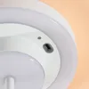 Close-up of a white lamp with a USB port and a small indicator light. Produktbild-Vorschau