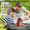 A father and son are grilling meat outdoors, with other people in the background. Produktbild-Vorschau