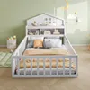 A child's bed with a house-shaped headboard and built-in shelves, set in a bedroom with green walls and wooden flooring. Anteprima dell’immagine prodotto