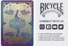 A playing card with a peacock design on one side and brand information and social media links on the other. Produktbild-Vorschau
