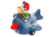 A decorative figurine of a reindeer in a blue airplane, with glitter accents. Produktbild-Vorschau