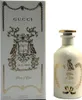 A perfume bottle and its packaging are displayed against a white background. Voir les images du produit