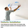 A man is installing a ceiling light fixture. Produktbild-Vorschau