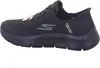 A side view of a black Skechers slip-on shoe. Produktbild-Vorschau