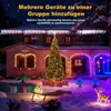 A house decorated with Christmas lights at night. Produktbild-Vorschau