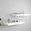 Two white floating shelves mounted on a light gray wall, decorated with various items. Anteprima dell’immagine prodotto