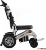 Side view of a silver and black electric wheelchair against a white background. Náhľad obrázku produktu